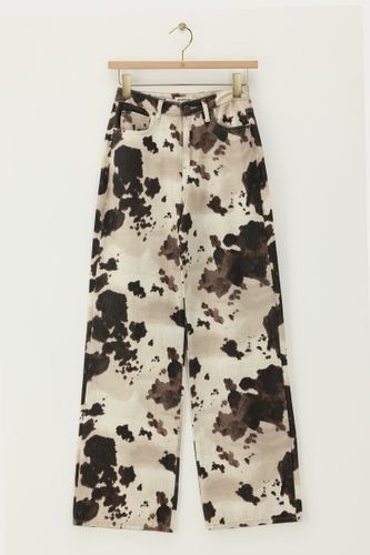 Denim-Jeans mit weitem Bein und Kuhflecken-Muster | - My jewellery - Modalova