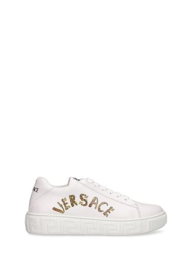 Sneakers De Piel Con Cordones - VERSACE - Modalova