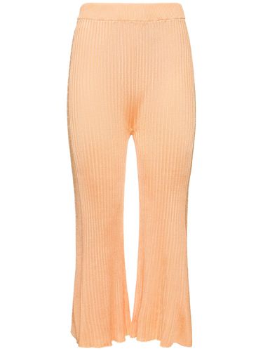 Ribbed Viscose Jersey Flared Crop Pants - JIL SANDER - Modalova