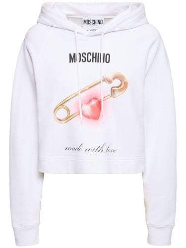 Printed Cotton Jersey Hooded Sweatshirt - MOSCHINO - Modalova