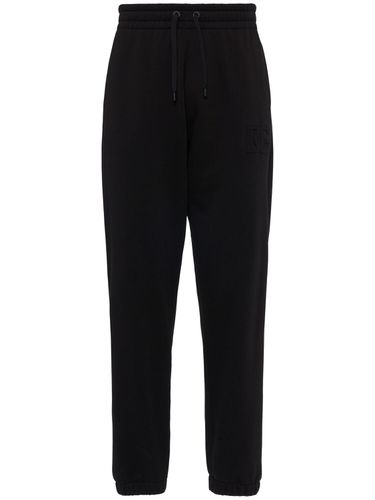 Pantaloni Jogging In Jersey Con Logo Goffrato - DOLCE & GABBANA - Modalova