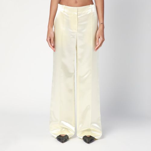 Milk-coloured Encore trousers - The Row - Modalova