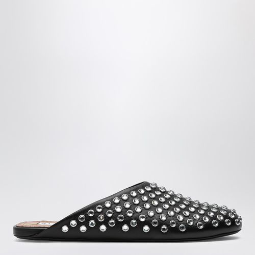 Mule flat con cristalli nera in pelle - Alaïa - Modalova