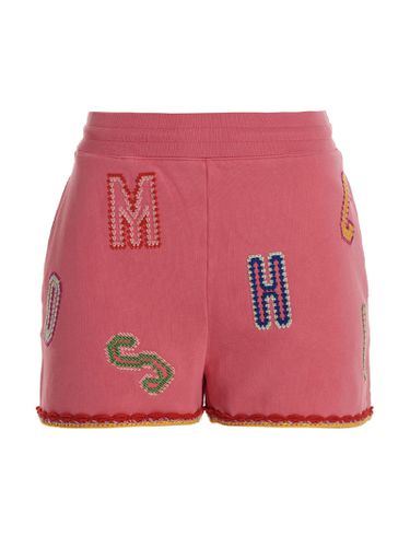 Lettering Embroidered Logo Bermuda Shorts - Moschino - Modalova