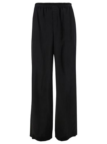 Jogger Pants With Elastic Waistband In Cupro Man - Saint Laurent - Modalova