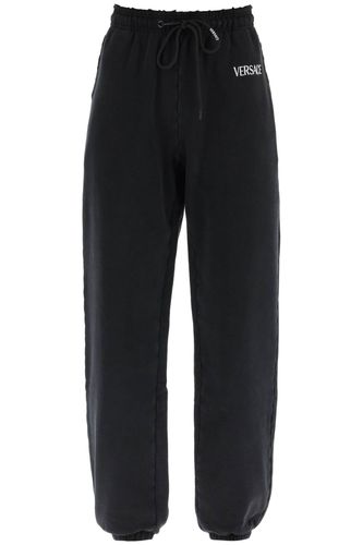 Versace Jogging Pants With Logo - Versace - Modalova