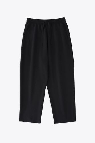 Knitwear - 16gg Knitted Joggers Black knitted pant with elastic waistband and cropped leg - Byhr - Studio Nicholson - Modalova