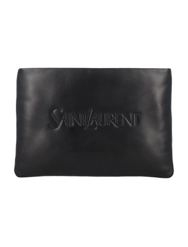 Padded Leather Clutch Bag With Logo - Saint Laurent - Modalova