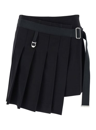 Jude Pleated Mini Skirt With Waist Belt In Virgin Wool - The Seafarer - Modalova