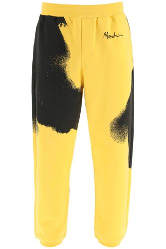 Graphic Print Jogger Pants With Logo - Moschino - Modalova