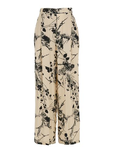 Edwina And Pants With All-over Floral Motif In Fabric Woman - SEMICOUTURE - Modalova