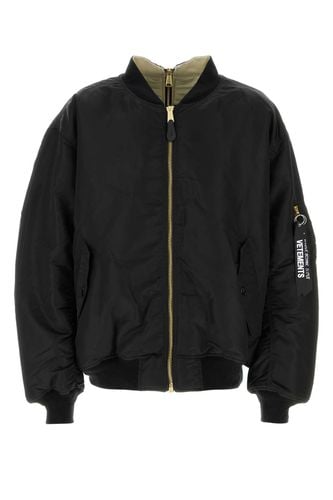 Nylon Reversible Padded Jacket - VETEMENTS - Modalova