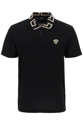 Greca Short-sleeved Polo Shirt - Versace - Modalova