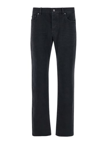 Slim Jeans With Logo Patch In Denim Man - Saint Laurent - Modalova