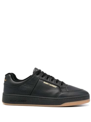 Low Top Sneakers With Laminated Logo In Hammered Leather Man - Saint Laurent - Modalova
