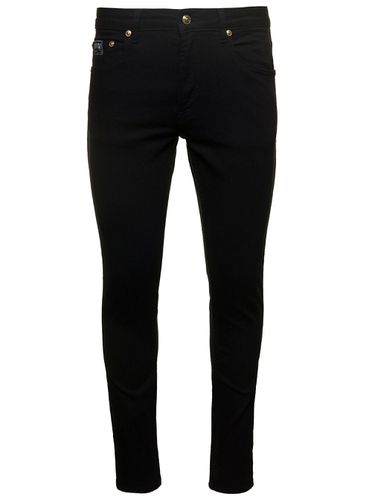 Skinny Jeans With Logo In Cotton Denim - Versace Jeans Couture - Modalova