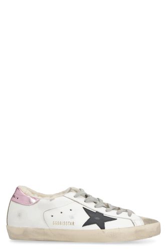 Super Star Sneakers With Logo Distressed Effect In Leather - Golden Goose - Modalova
