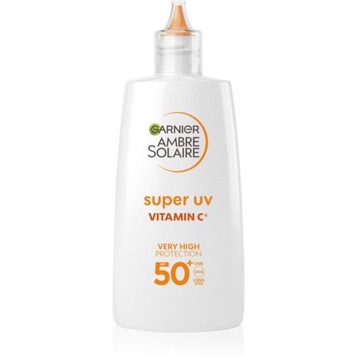 Ambre Solaire Super UV loción protectora antimanchas oscuras textura ligera con vitamina C SPF 50+ 40 ml - Garnier - Modalova