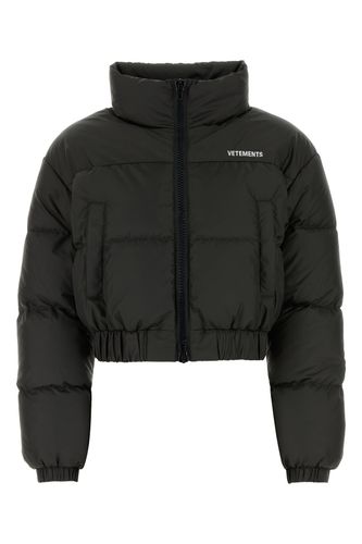 Slate polyester down jacket - VETEMENTS - Modalova