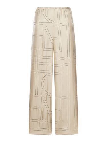 Monogram silk PANTS - Woman - Toteme - Modalova