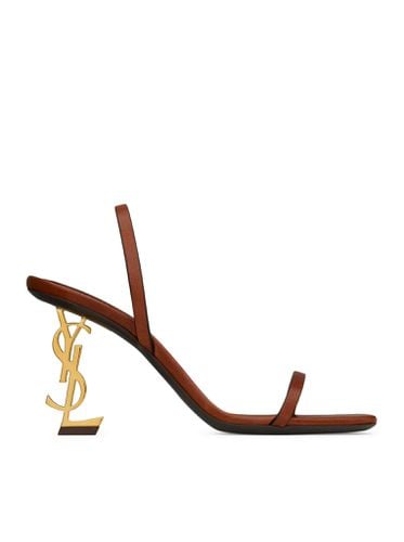 OPYUM SANDALS IN VEGETABLE TANNED LEATHER WITH BACK STRAP - - Woman - Saint Laurent - Modalova