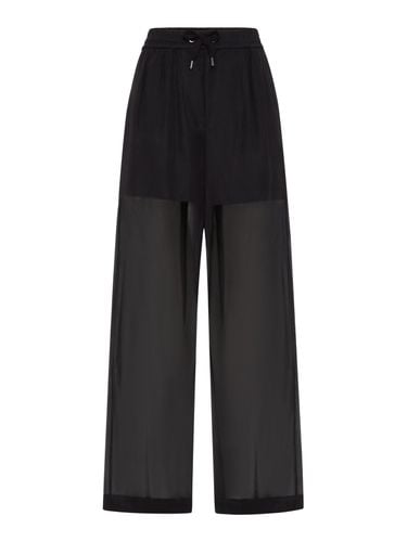 SEMI-TRANSPARENT COTTON TROUSERS - Woman - Brunello Cucinelli - Modalova