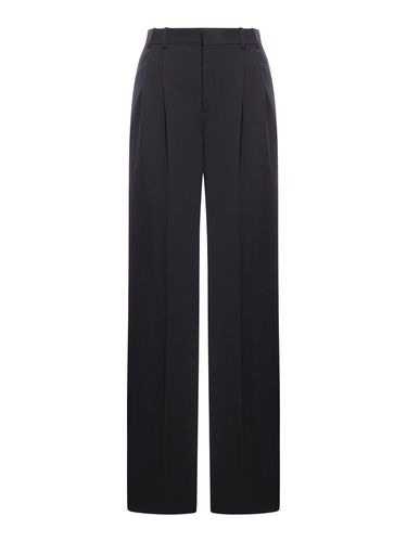 WIDE LEG TROUSERS IN GRAIN DE POUDRE - Woman - Saint Laurent - Modalova