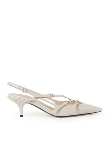 Patent leather slingback pumps with buckles - Woman - Miu Miu - Modalova