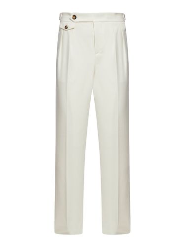 Tapered trousers with pleats - Man - Brunello Cucinelli - Modalova