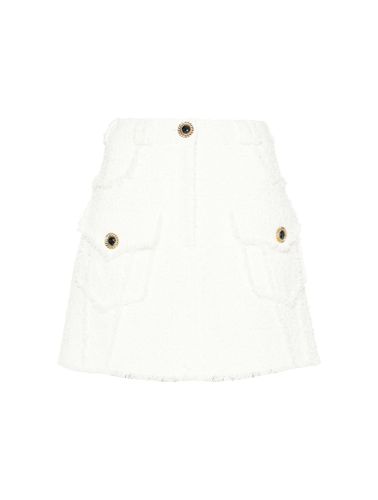 A-line tweed miniskirt - Woman - Balmain - Modalova