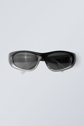 Trek Sonnenbrille Schwarz, Sonnenbrillen in Größe Onesize. Farbe: - Weekday - Modalova
