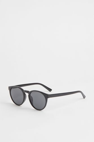 Runde Sonnenbrille Schwarz, Sonnenbrillen in Größe Onesize. Farbe: - H&M - Modalova