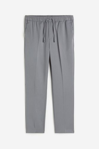 Joggpants in Slim Fit Grau, Chinohosen Größe S. Farbe: - H&M - Modalova
