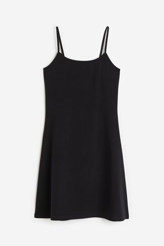 Jerseykleid mit ausgestelltem Rock Schwarz, Alltagskleider in Größe M. Farbe: - H&M - Modalova