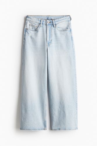 Wide High Cropped Jeans Blasses Denimblau, Baggy in Größe 34. Farbe: - H&M - Modalova