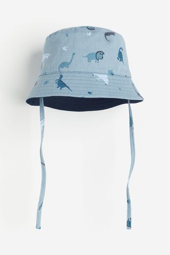 Wendbarer Bucket Hat Blau/Dinosaurier, Hut in Größe 74/80. Farbe: - H&M - Modalova