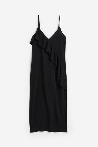 Slipkleid mit Volantdetail Schwarz, Alltagskleider in Größe XS. Farbe: - H&M - Modalova