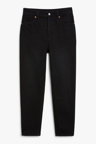 Schmal zulaufende Jeans Taiki mit hohem Bund Schwarz, Straight in Größe W 24. Farbe: - Monki - Modalova
