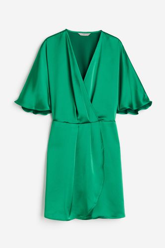 Wickelkleid aus Satin Grün, Alltagskleider in Größe XS. Farbe: - H&M - Modalova