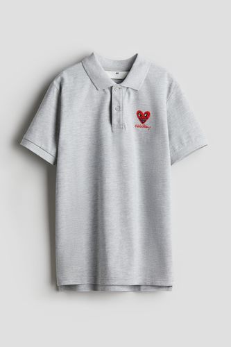Poloshirt aus Pikee mit Motivstickerei Hellgrau/Keith Haring, T-Shirts & Tops in Größe 158/164. Farbe: - H&M - Modalova