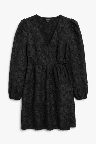 Schwarzes Babydoll-Wickelkleid aus Jacquard Schwarz, Alltagskleider in Größe M. Farbe: - Monki - Modalova