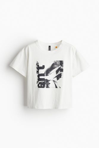 T-Shirt mit Print Cremefarben/Kodak in Größe XS. Farbe: - H&M - Modalova