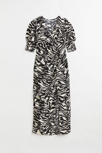 Crêpe-Kleid mit Puffärmeln Schwarz/Zebramuster, Alltagskleider in Größe XS. Farbe: - H&M - Modalova