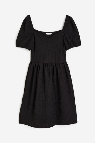 Strukturiertes Jerseykleid mit Puffärmeln Schwarz, Alltagskleider in Größe XS. Farbe: - H&M - Modalova