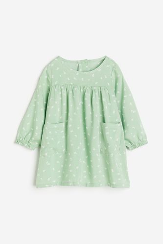 Kleid mit Taschen Hellgrün/Geblümt, Kleider in Größe 74. Farbe: - H&M - Modalova