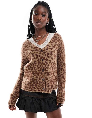 Cardigan leopardato con scollo a V soffice - Collusion - Modalova