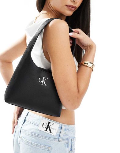 Borsa da spalla nera stile minimal con logo a monogramma - Calvin Klein Jeans - Modalova