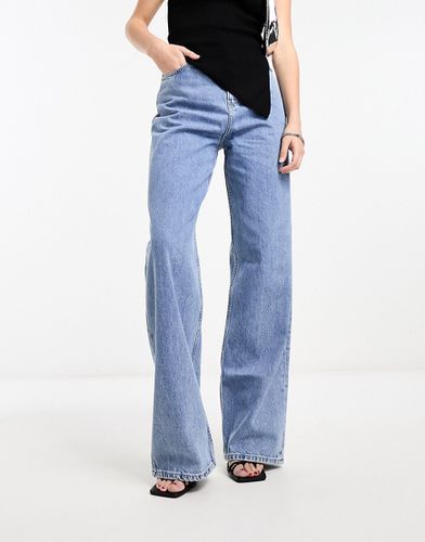 Jeans comodi a vita alta lavaggio medio - Calvin Klein Jeans - Modalova