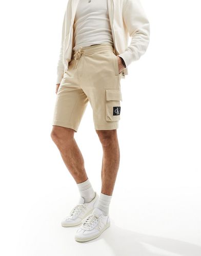 Pantaloncini in jersey beige con logo - Calvin Klein Jeans - Modalova