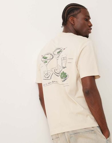 T-shirt beige con stampa "Luxe Holiday" sul retro - Abercrombie & Fitch - Modalova